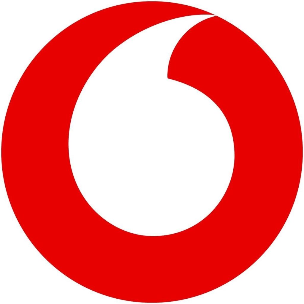 Logotipo circular vermelho com um centro branco e um entalhe curvo, lembrando um sinal de fala estilizado ou apóstrofo.